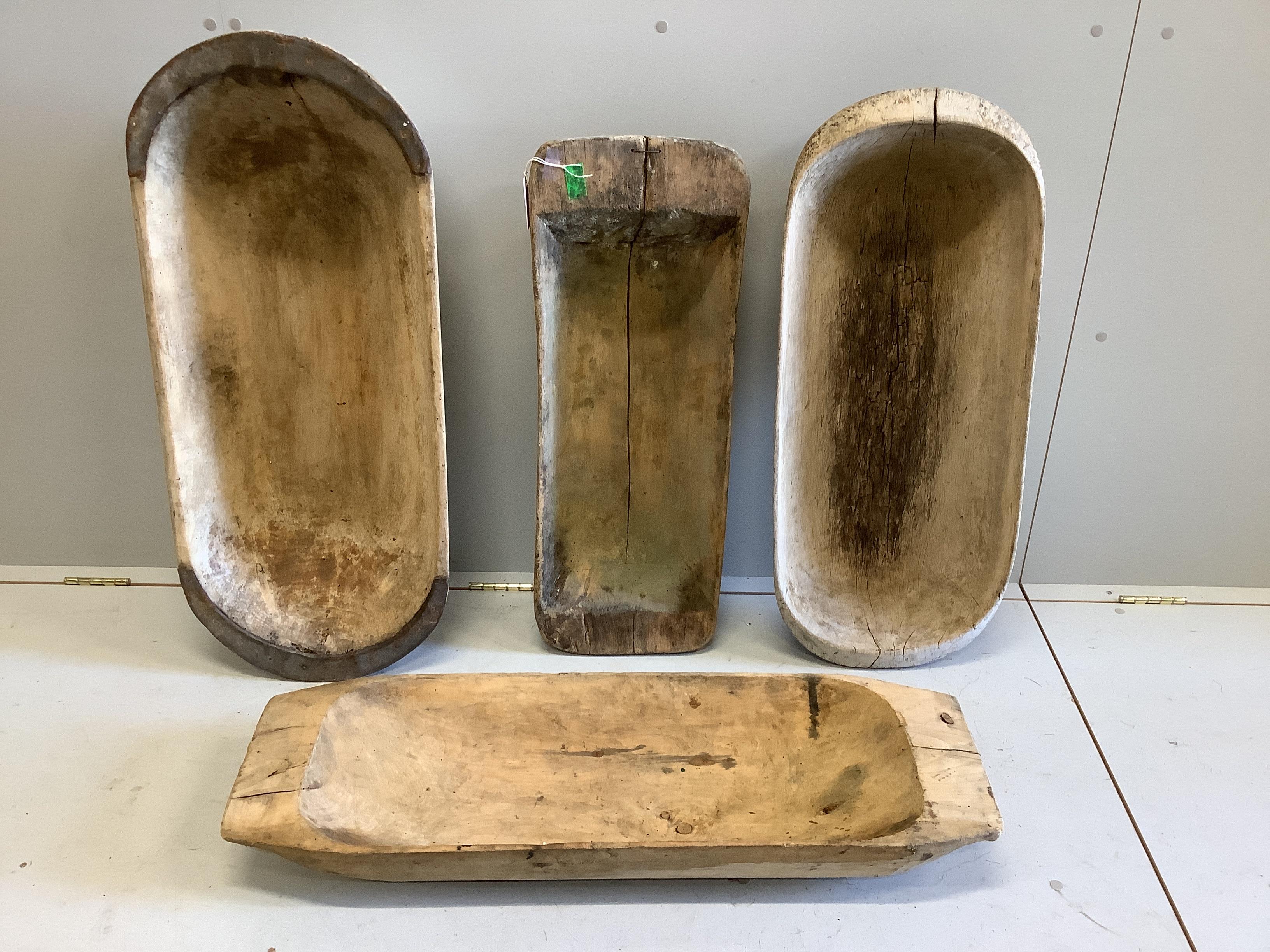 Four vintage wood mazers, largest length 93cm